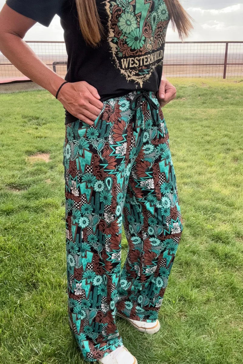 Tattoos in Turquoise joggers