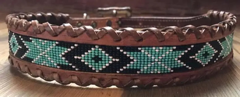 Genuine leather dog collar with teal, white, and black southwest beaded inlay design, a leather wrapped edge