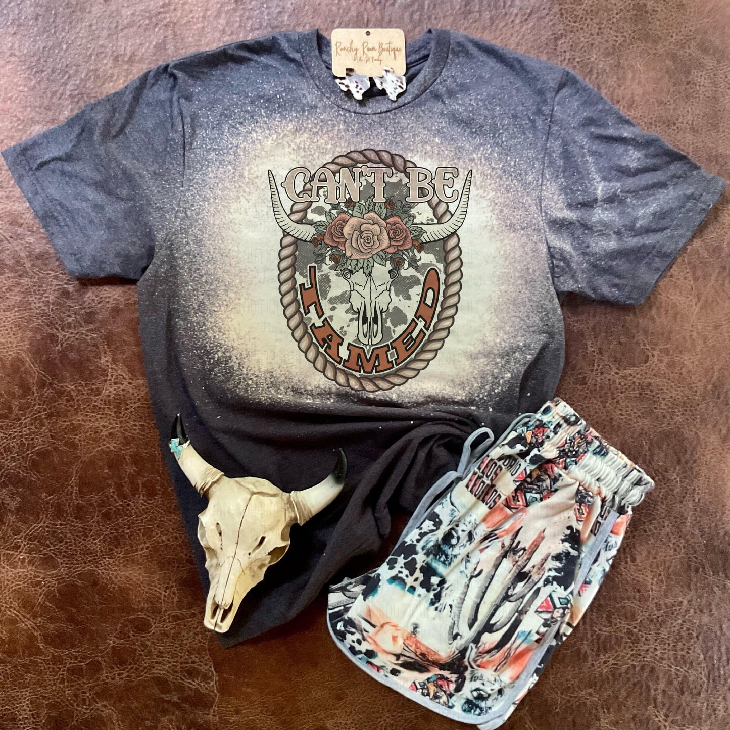 Can’t Be Tamed Tee