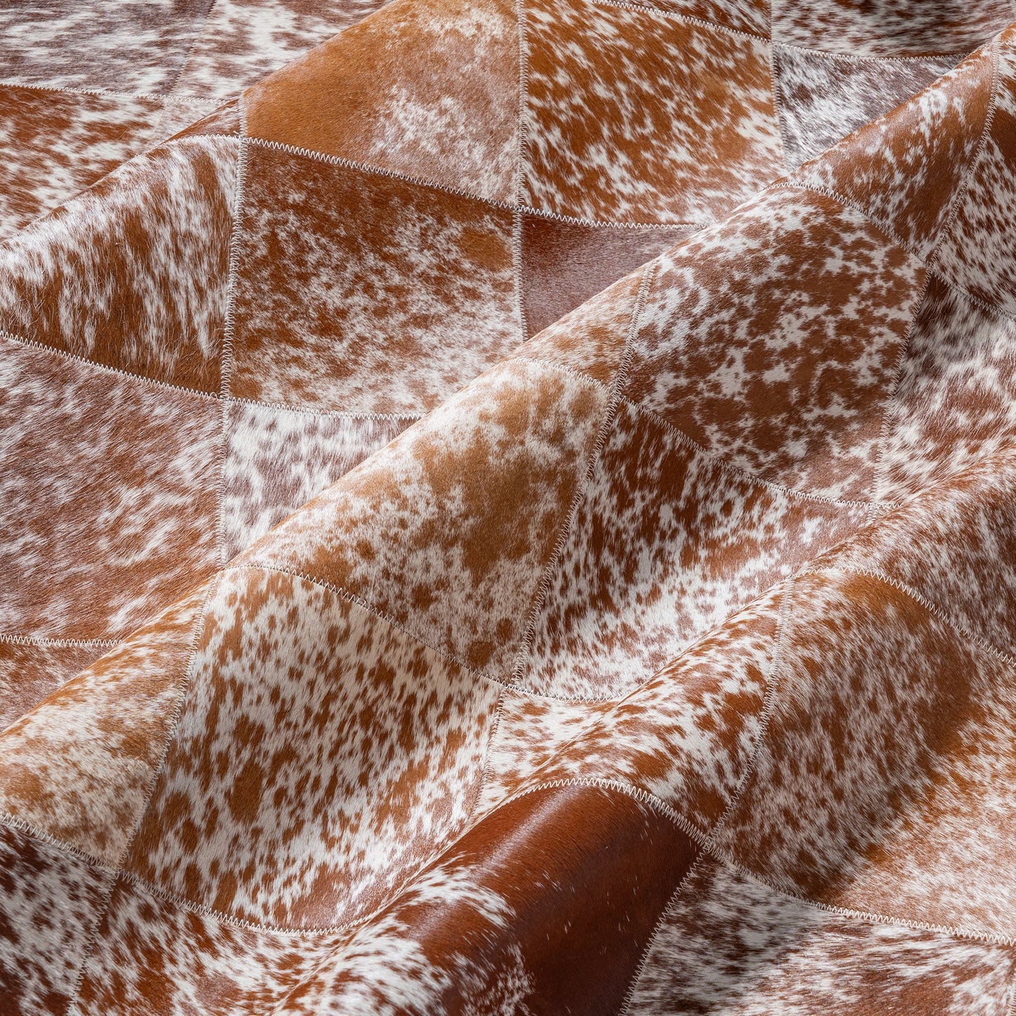 Brown and White Speckled Cowhide Patchwork Rug