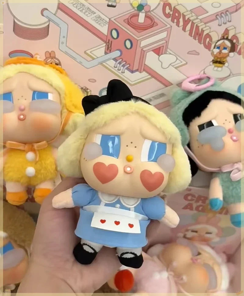 Unleash Fun Surprises with the Crybaby Crying Again Series Blind Box Vinyl Face Doll Keychains - Collect Them All!