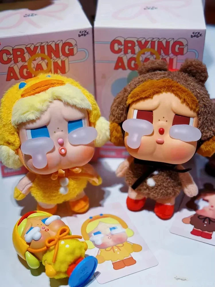 Unleash Fun Surprises with the Crybaby Crying Again Series Blind Box Vinyl Face Doll Keychains - Collect Them All!