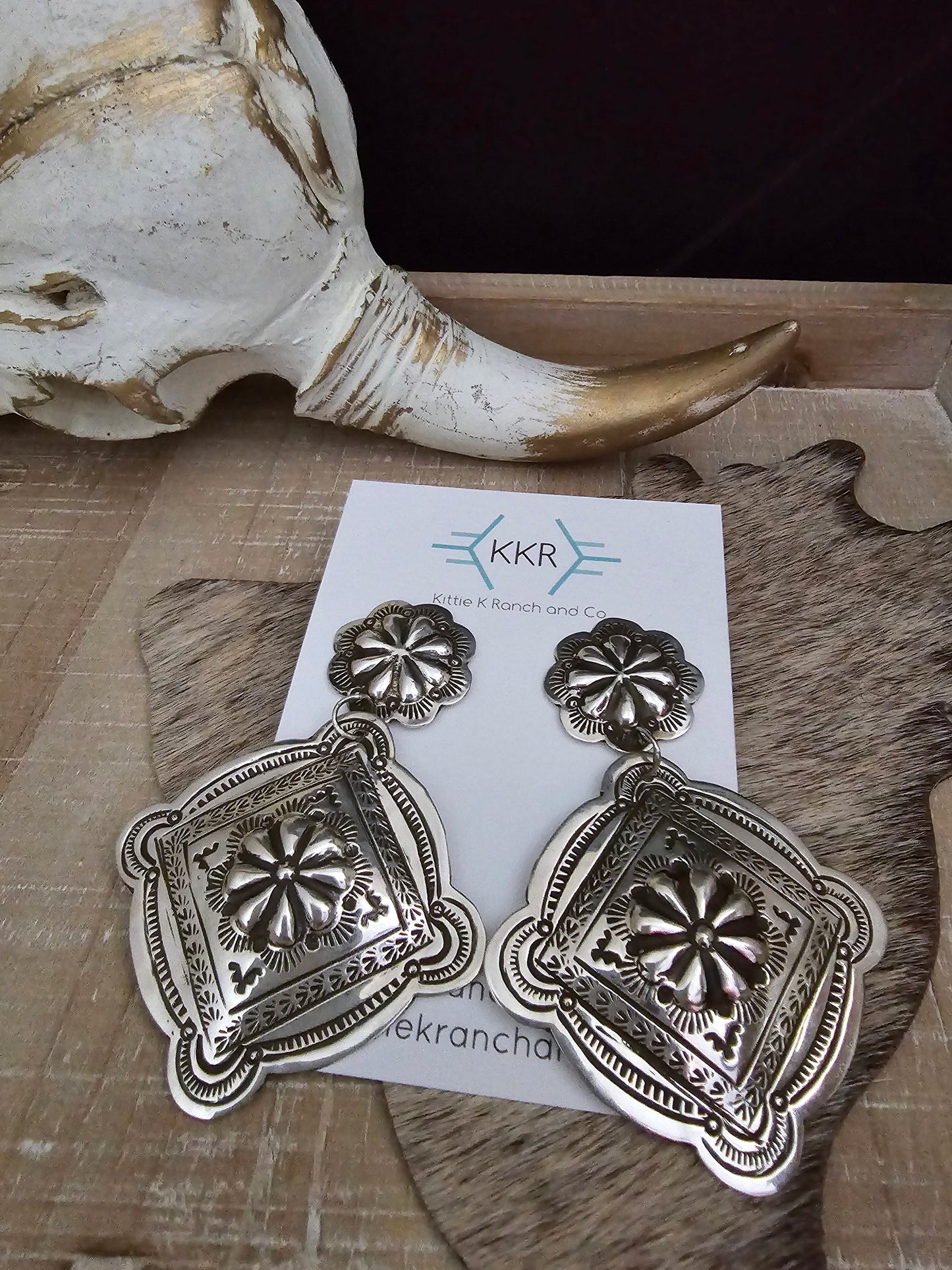 JENNIE BLACKGOAT DOUBLE CONCHO EARRINGS