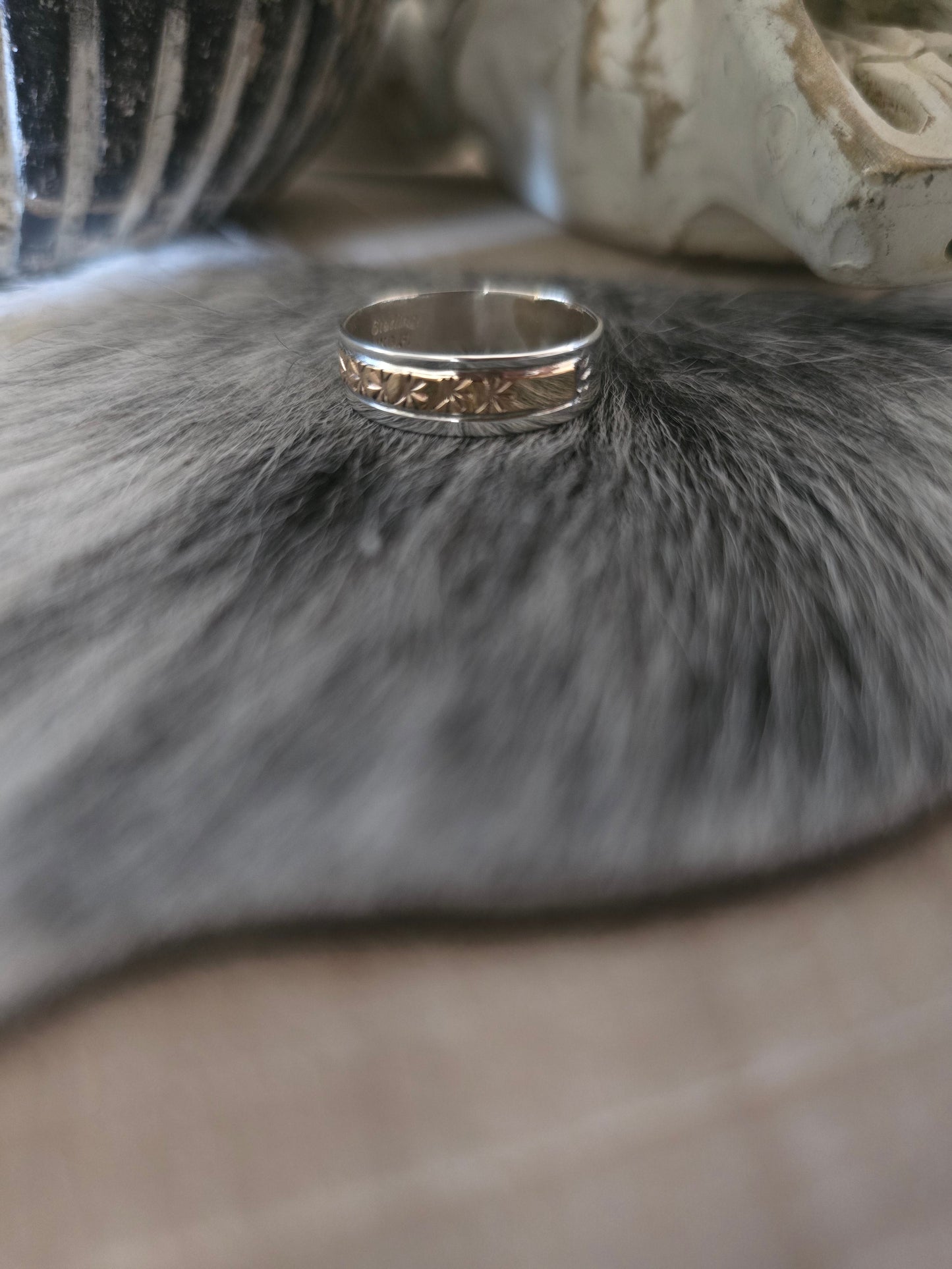 JUANITA PINO STERLING SILVER AND 14KT GOLD BAND