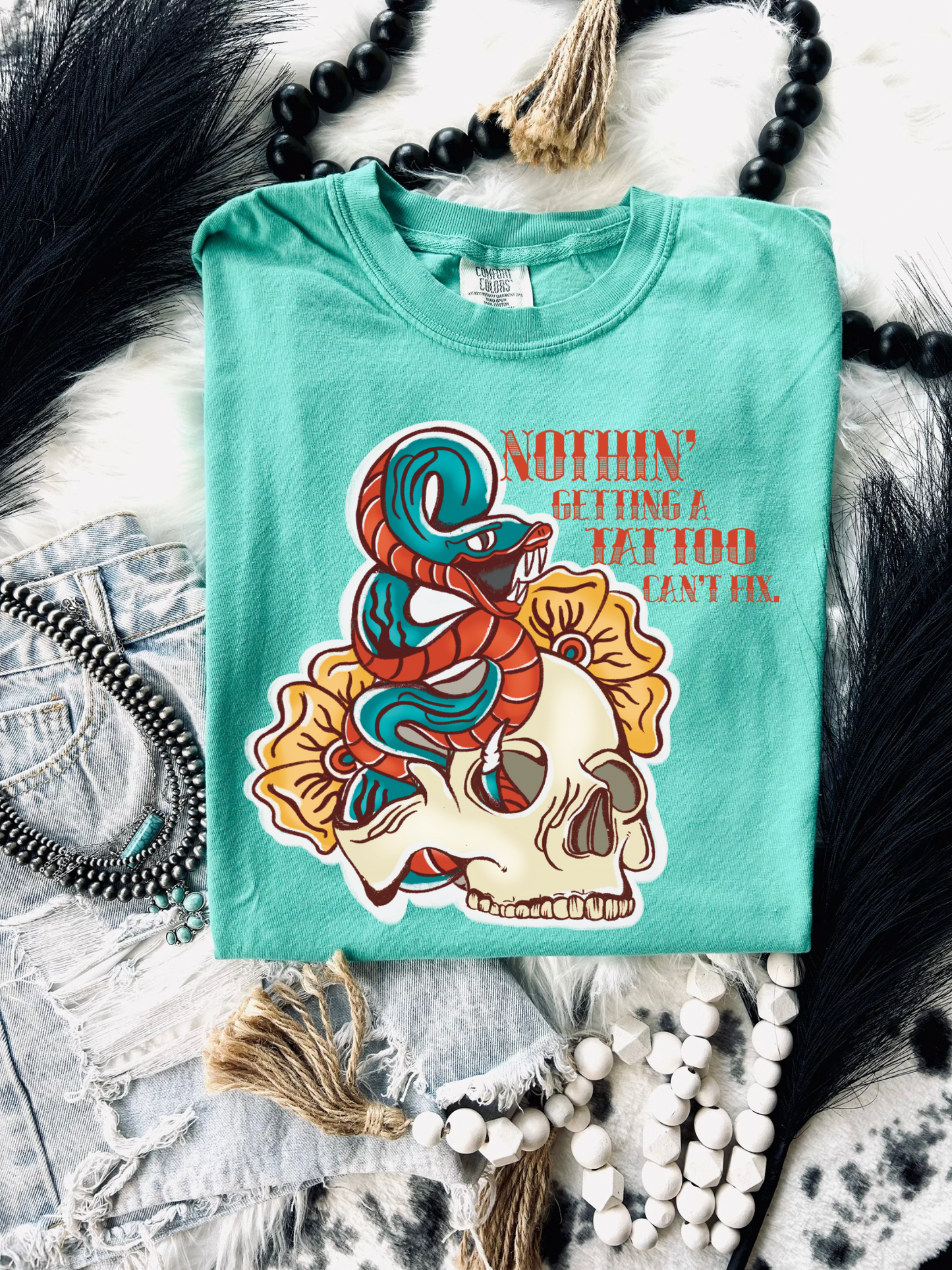 Nothing a tattoo can’t fix tee