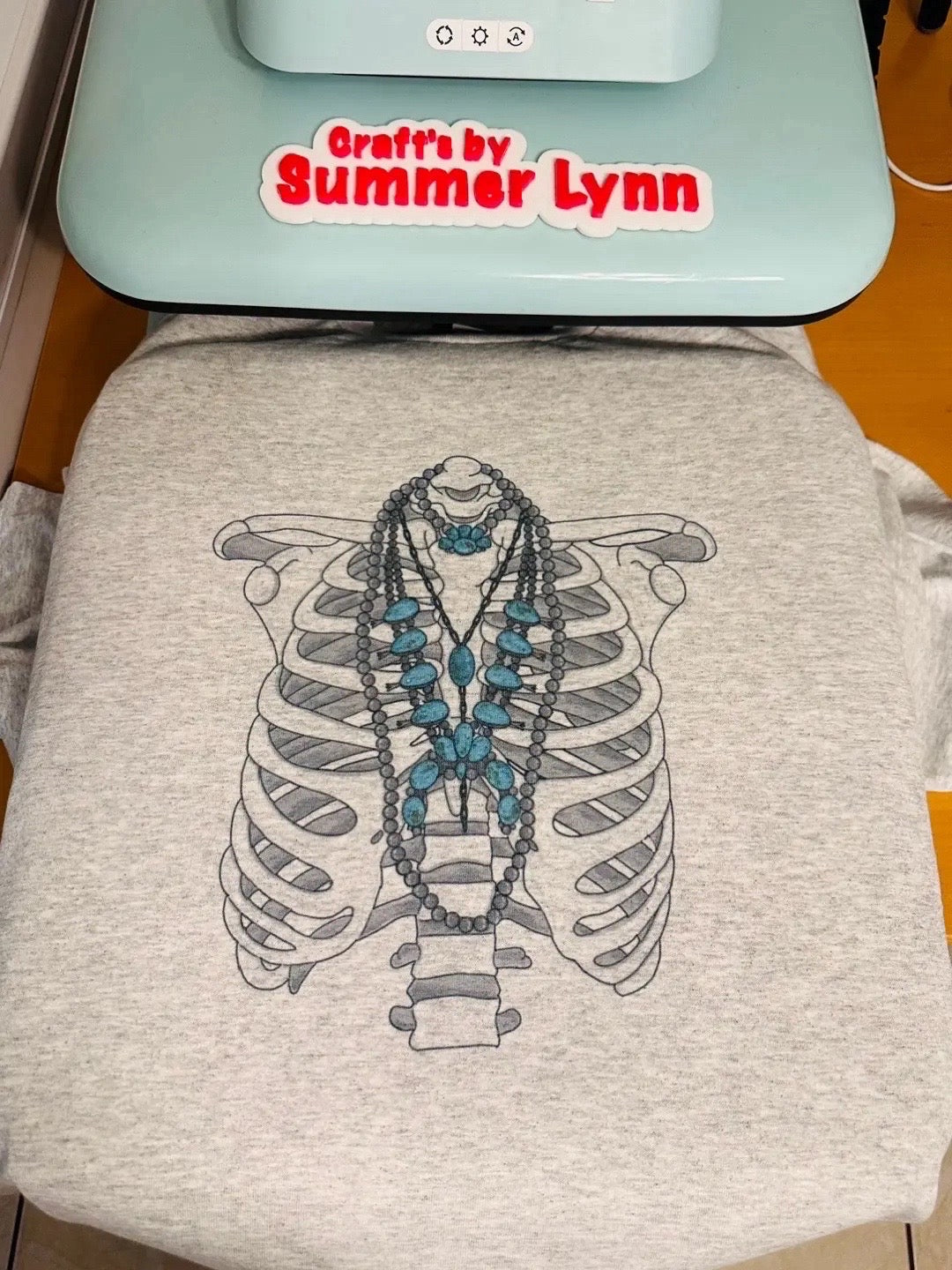 Turquoise skeleton Top