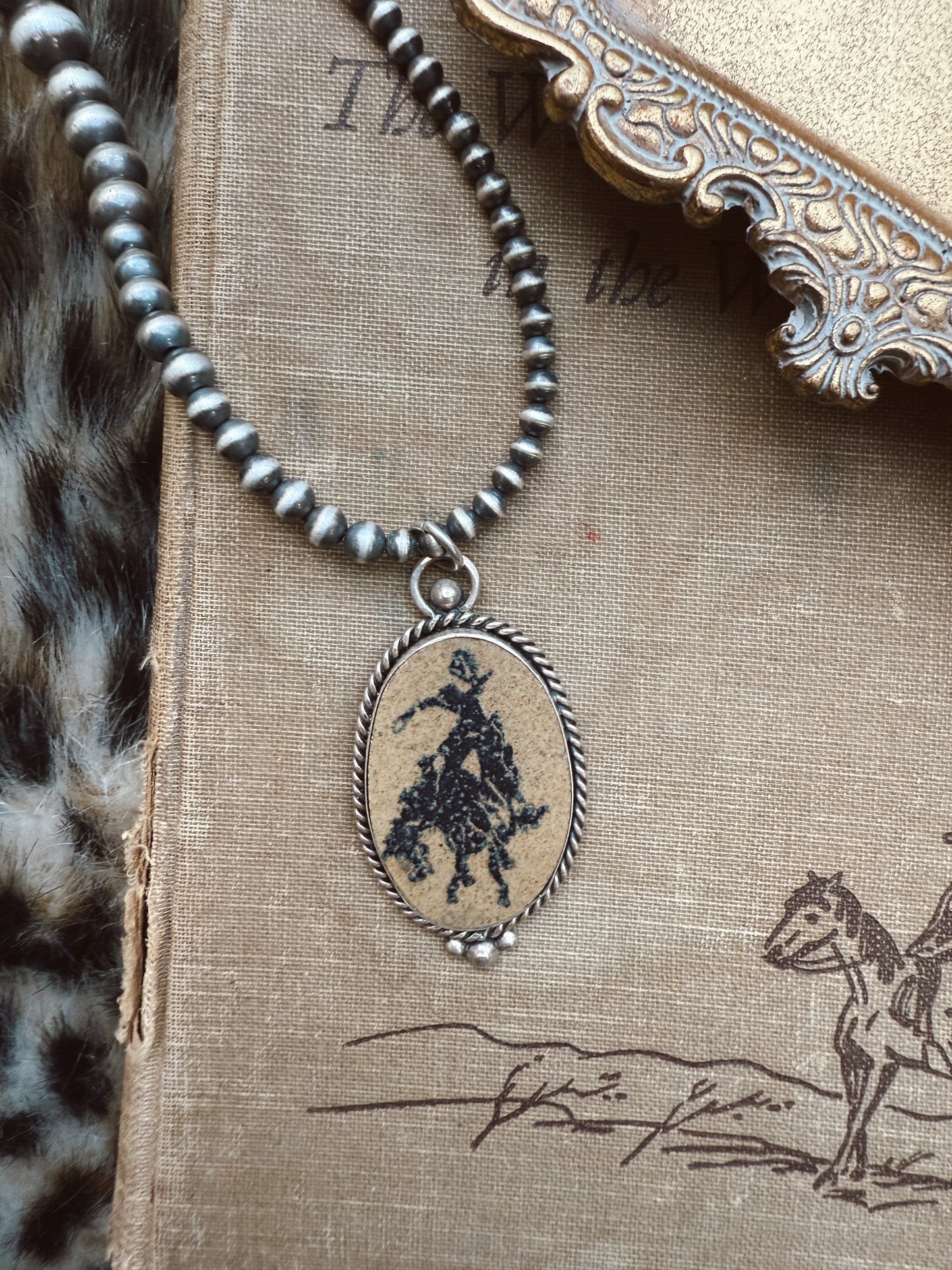 The Broncin pendant