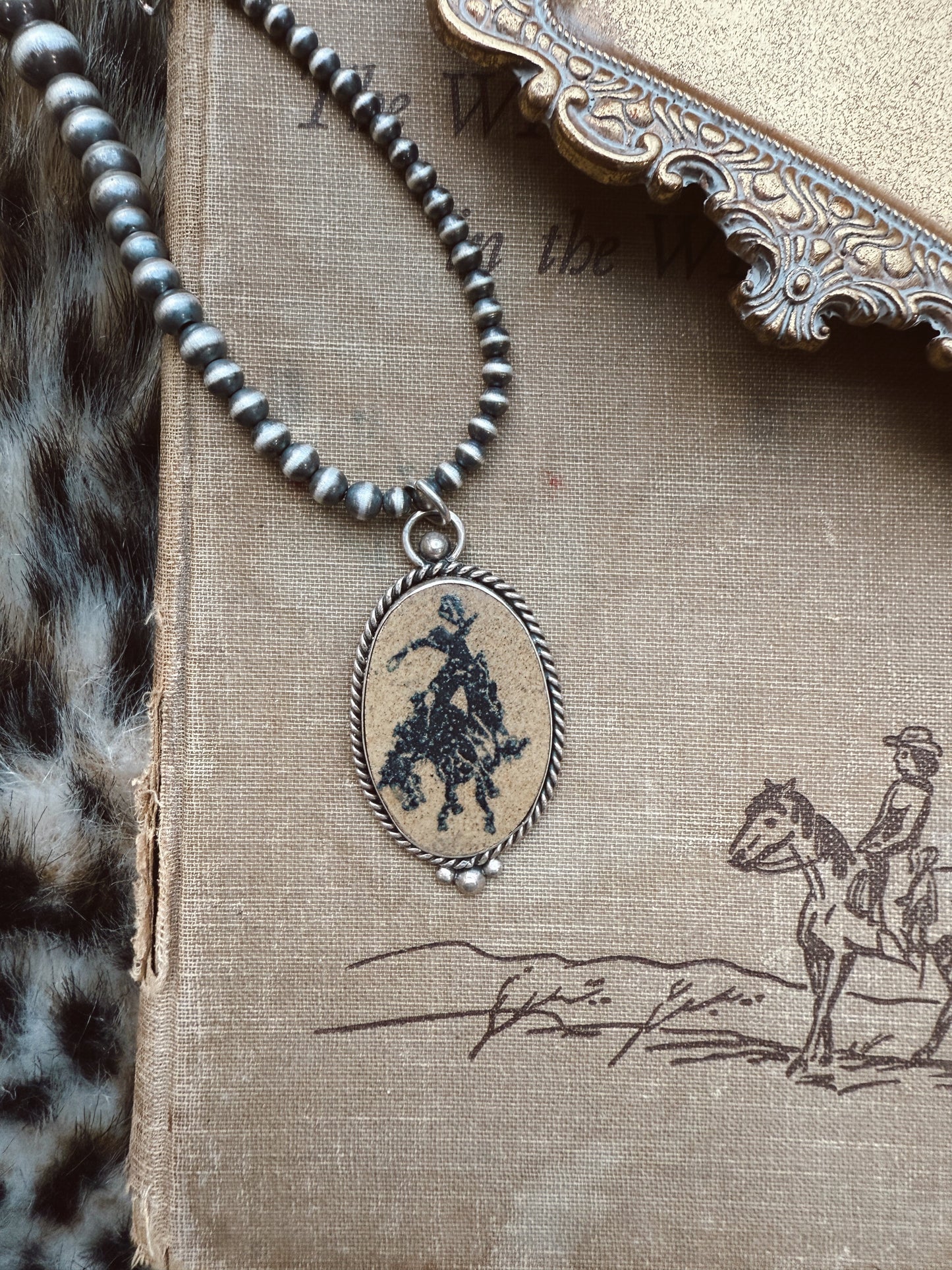 The Broncin pendant