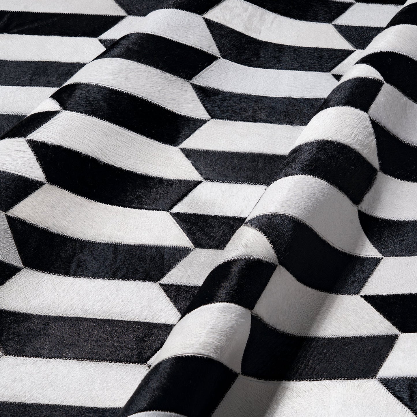 Figaro Black and White Patchwork Cowhide Rug