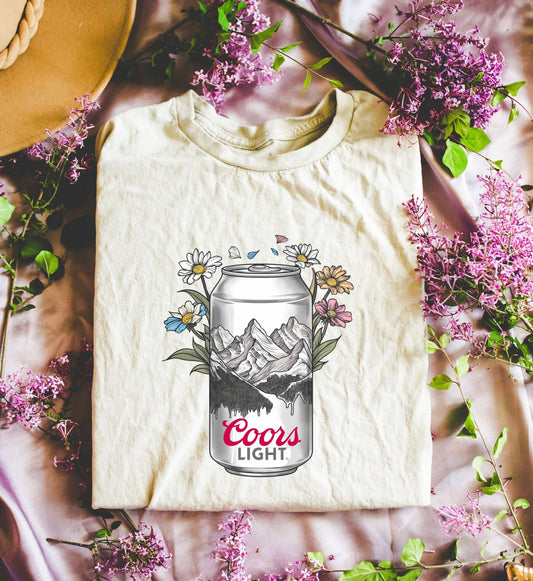 light silver can beer w/ flower design