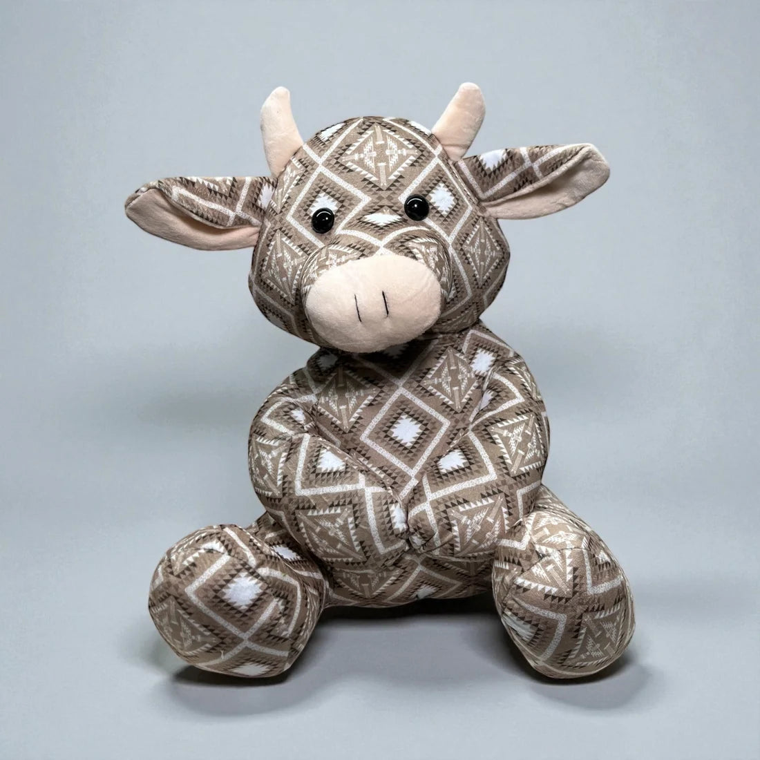 Brown Aztec cow farm pal