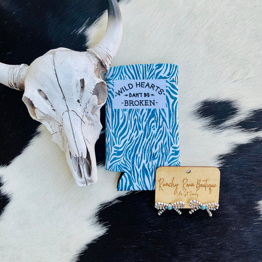 Wild Hearts Can’t Be Broken Slim Koozie