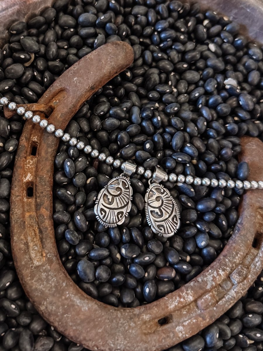 Showman Silver Pendant